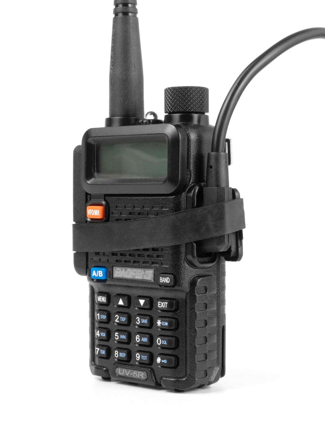 Baofeng UV-5R with PTT guard, o-ring volume dial and rubber band holding external PTT / comms setup tightly in place.