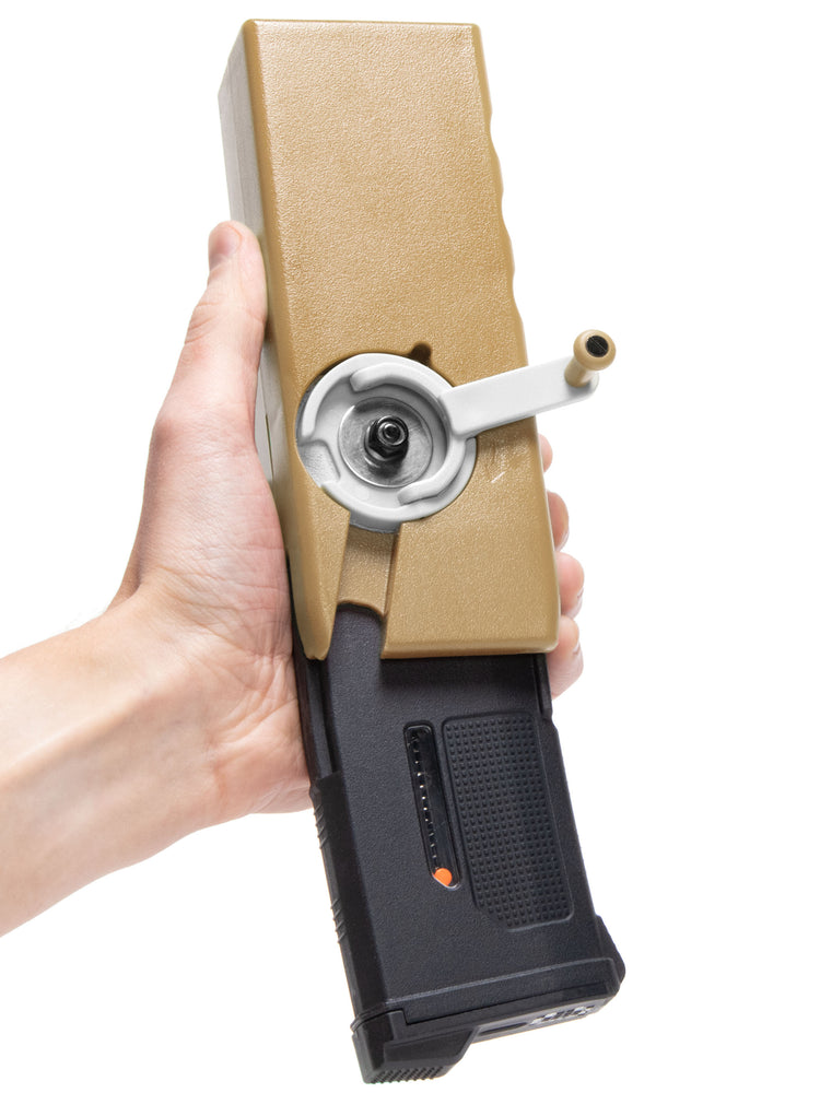 EMG ODIN M12 sidewinder speedloader filling an airsoft PTS EPM1S magazine#color_dark-earth