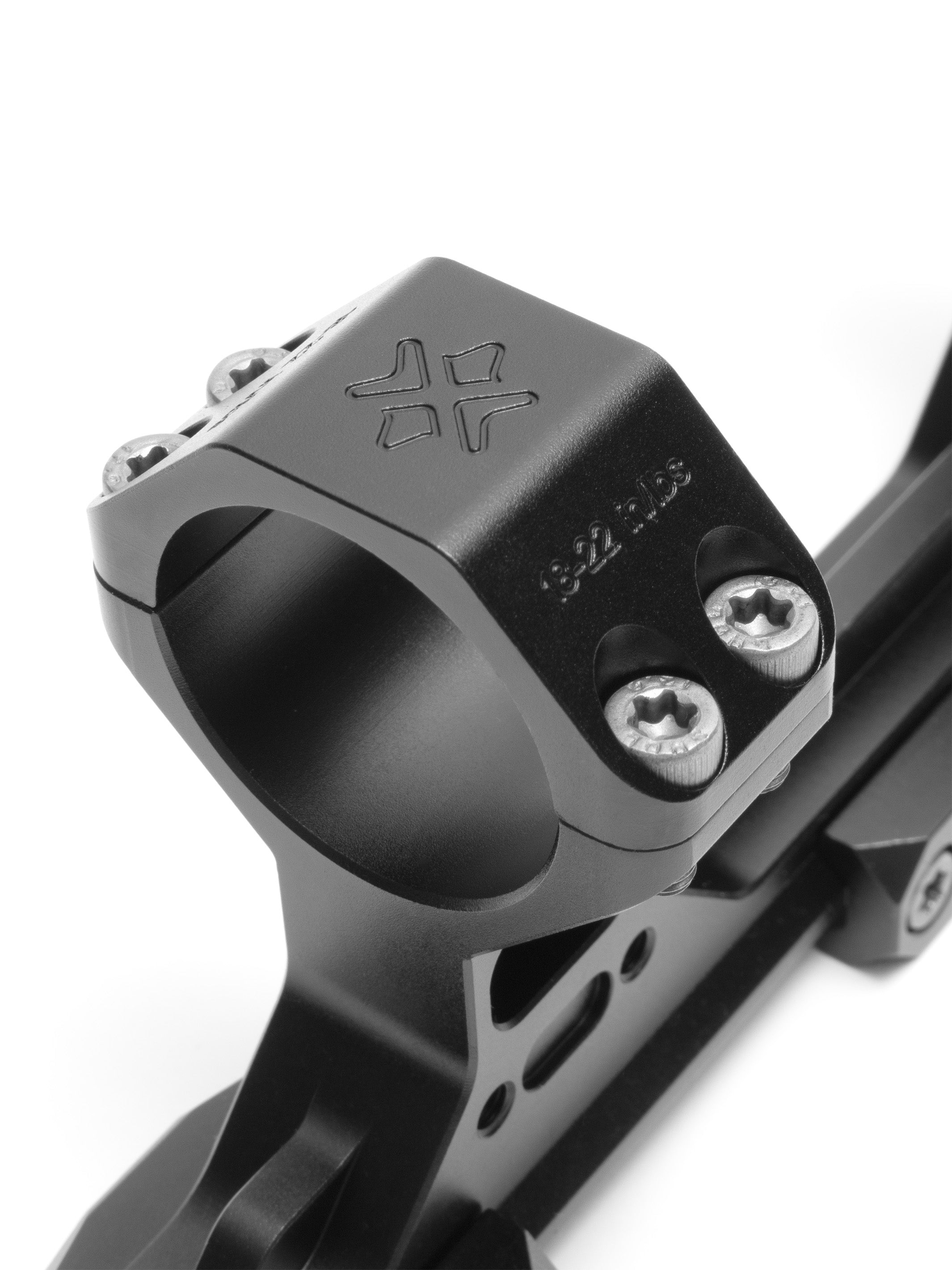 Close-up of a 30mm ring showing the X-ACCU marking and its 18-22 in/lbs torque spec