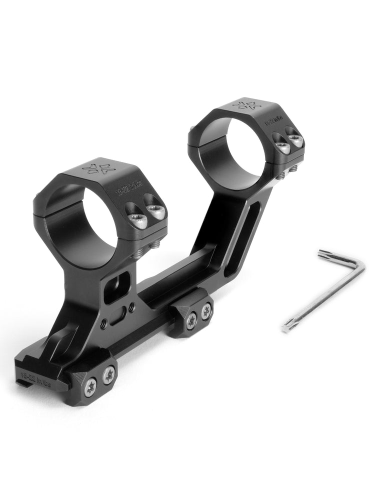 One-piece 30mm scope mount with dual rings and cantilever body, shown with included hex key.