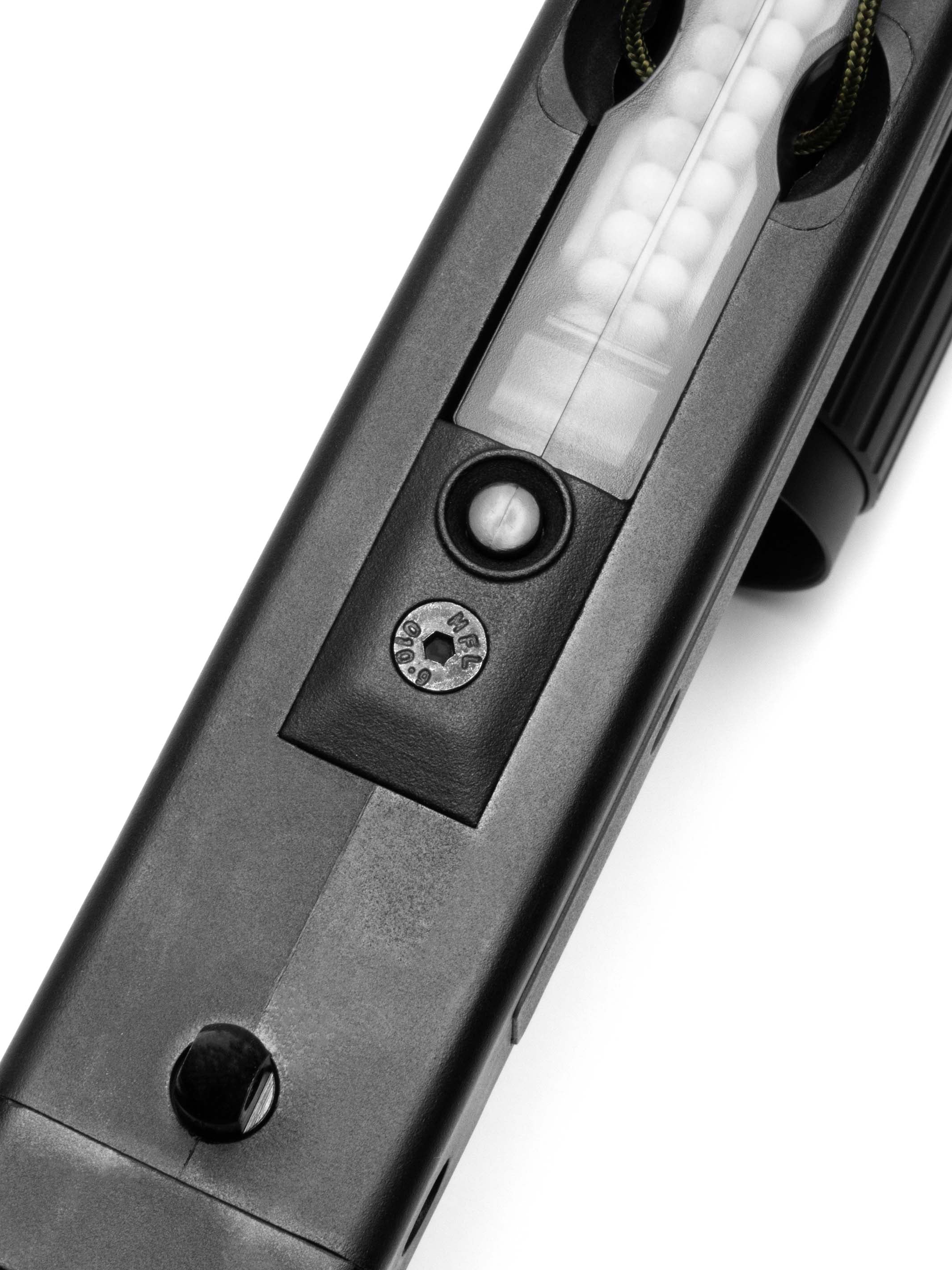 Protective cover for SSG11 magazine release / eject button installed on the SSG11 replica