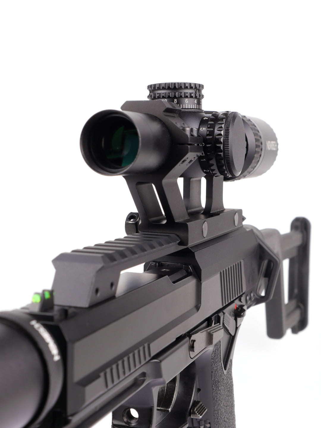 Rifle scope mounted on the full-length picatinny rail of the Nano Carbine