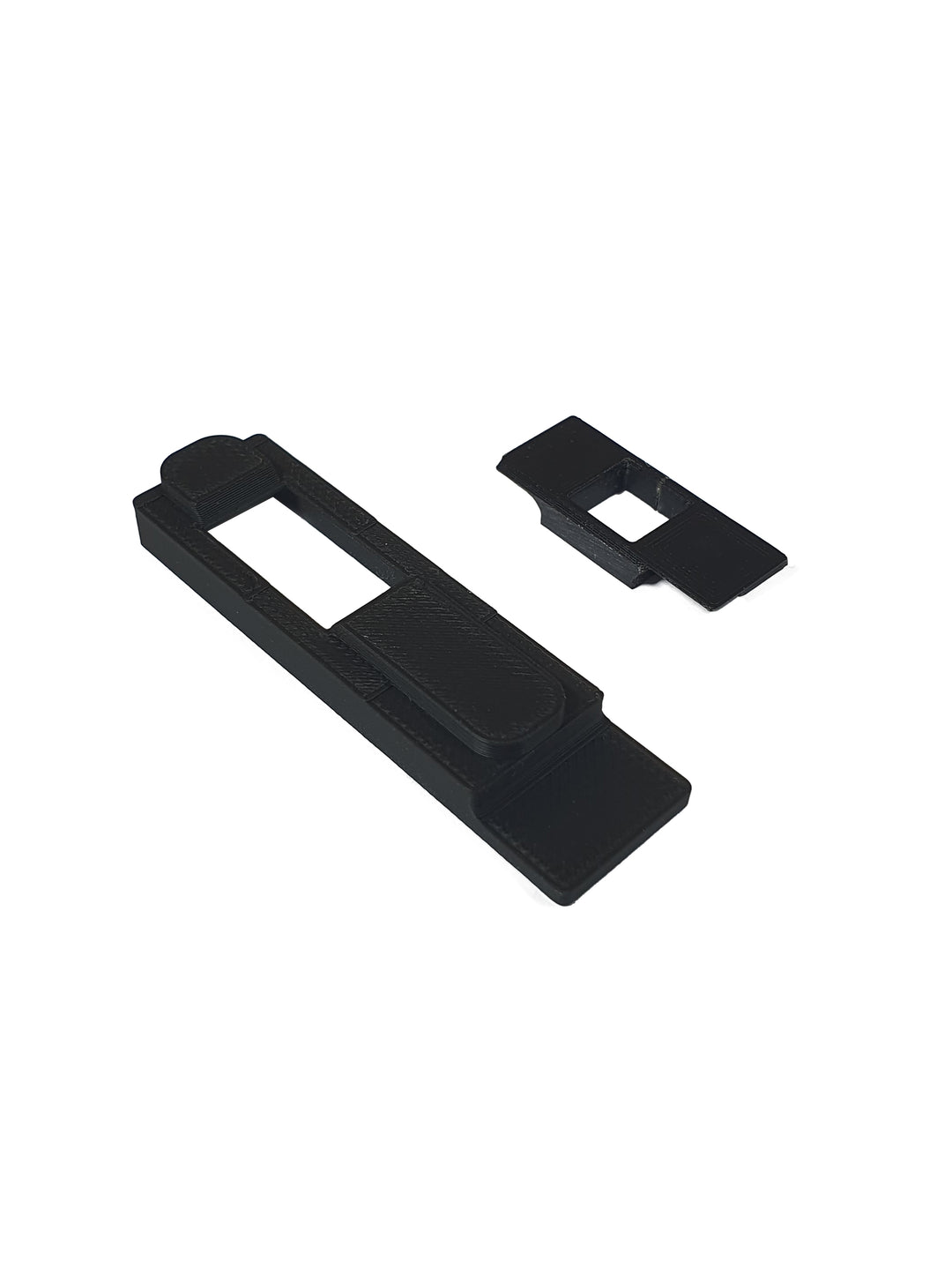 Standard and extended versions of the 3D printed SSG24 trigger dust cover side by side