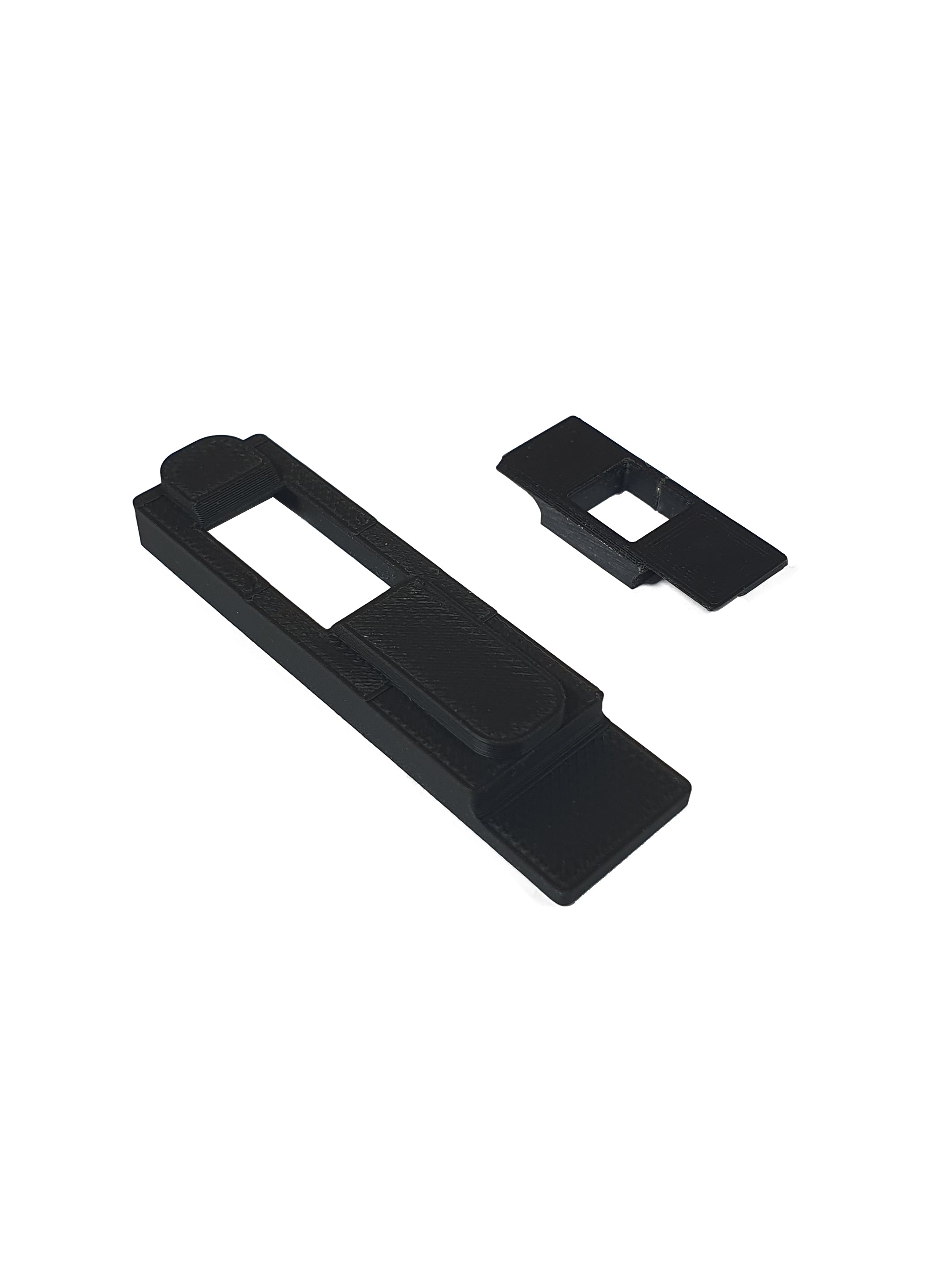 Standard and extended versions of the 3D printed SSG24 trigger dust cover side by side