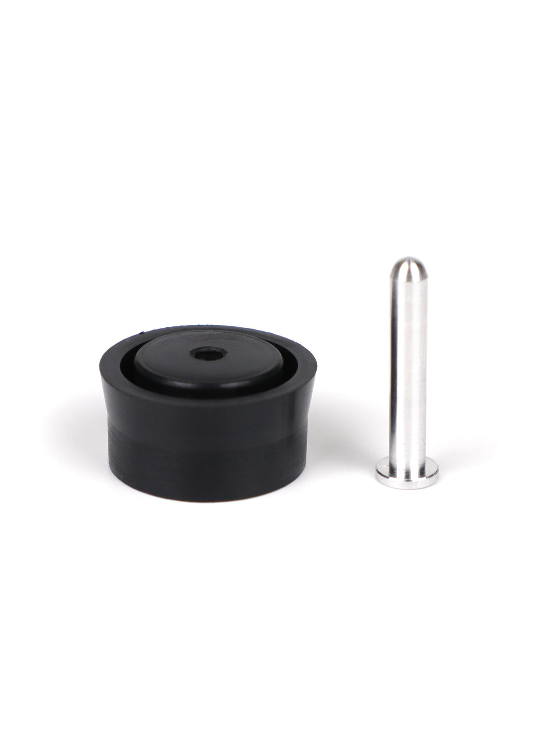 Single aluminum airbrake pin standing next to the black Modify piston head for the SSG96